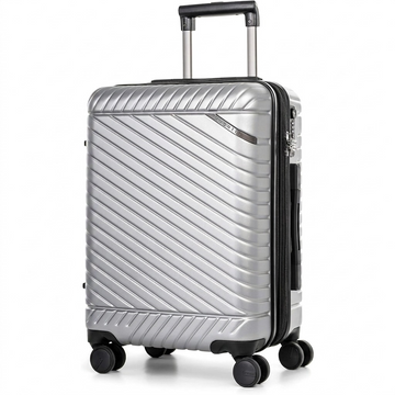 Silver Bugatti Oslo carry-on luggage with textured polycarbonate shell, telescoping handle, and spinner wheels.