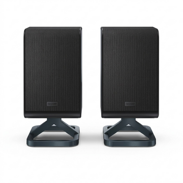 Sharp HT-SPR52021-BK 2.0.2 channel wireless rear surround speakers in black, front view on integrated stands.