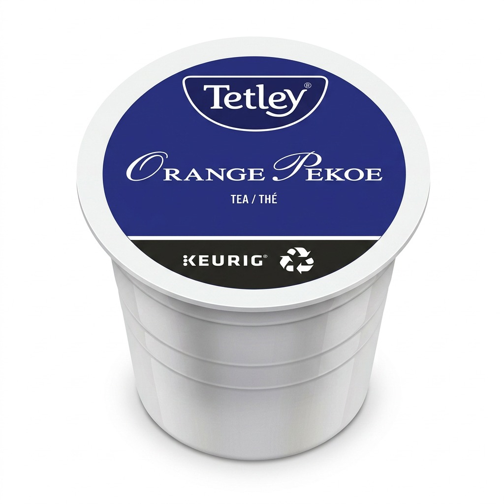 A high-resolution, centered photograph of a single Tetley Orange Pekoe K-Cup pod.