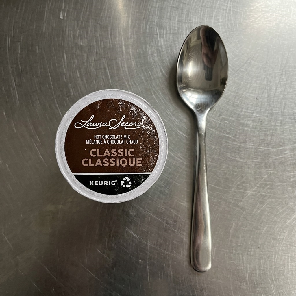 A precise hero shot of the Laura Secord Hot Chocolate K-Cup, showcasing its label and classic flavour.