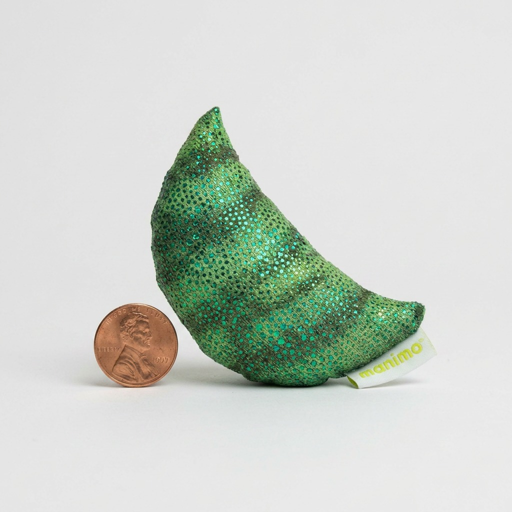 A pure high-resolution hero shot of the fdmt manimo Green Half Moon Ball with its shiny textured surface, centered on a clean white background.