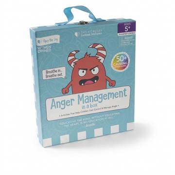 A clean, high-resolution hero shot of the 'Anger Management in a Box' toolkit from Open the Joy. The light blue box, featuring the red horned monster and educational text, is centered against a pure white background with realistic lighting and soft shadows. The light blue carry handle is visible at the top. This image showcases the exact product design without any external packaging or props, ideal for e-commerce.