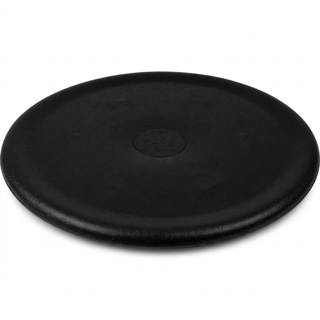 Black fdmt Kore Floor Wobbler balance disc for active sitting, hero shot on a white background.