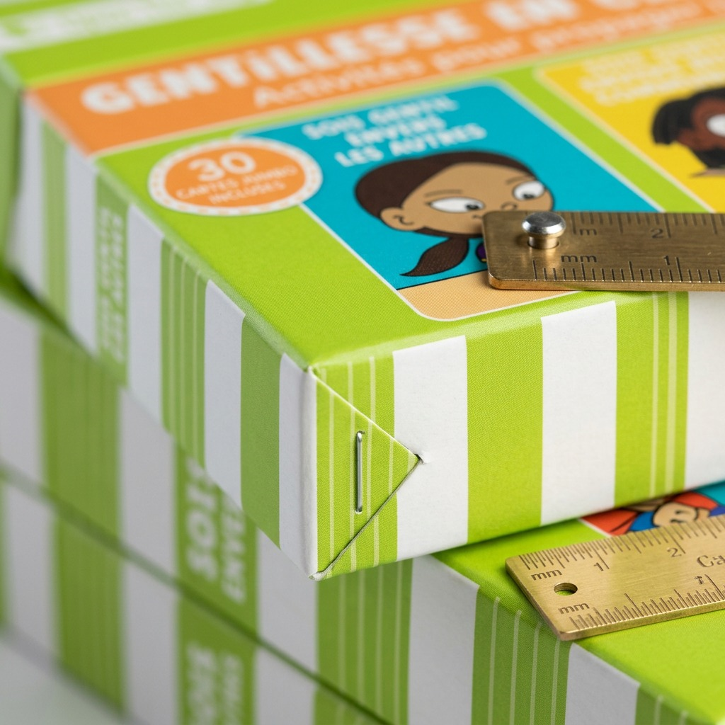 Macro view of fdmt Gentillesse box showing matte finish and staple. UPC 850051355921.