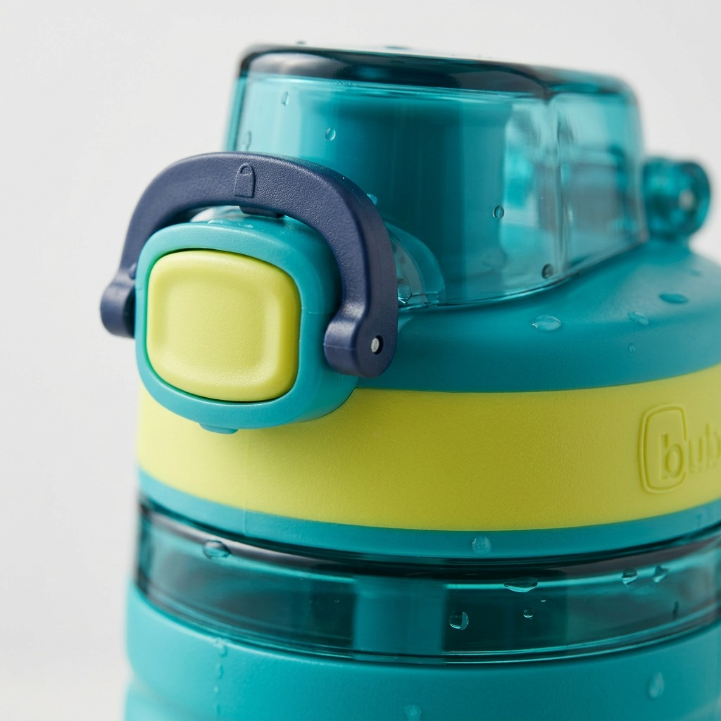 Premium high-resolution hero shot: bubba bubba 16 oz Flo water bottle, Scuba blue with Limelight accents.